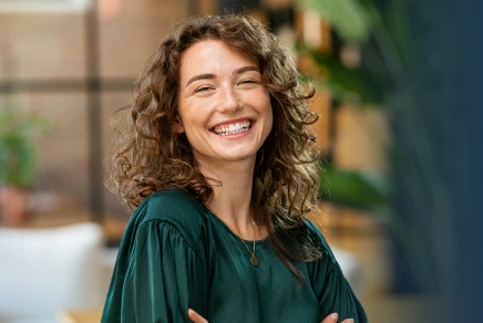 Happy mature woman of South Hills Dental Arts in Upper St. Clair